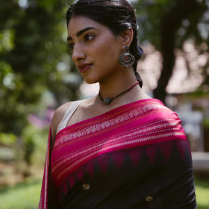 Black Handloom Korvai Kanchi Cotton Saree With Annam And Rudaksham Motifs in A Pink Border
