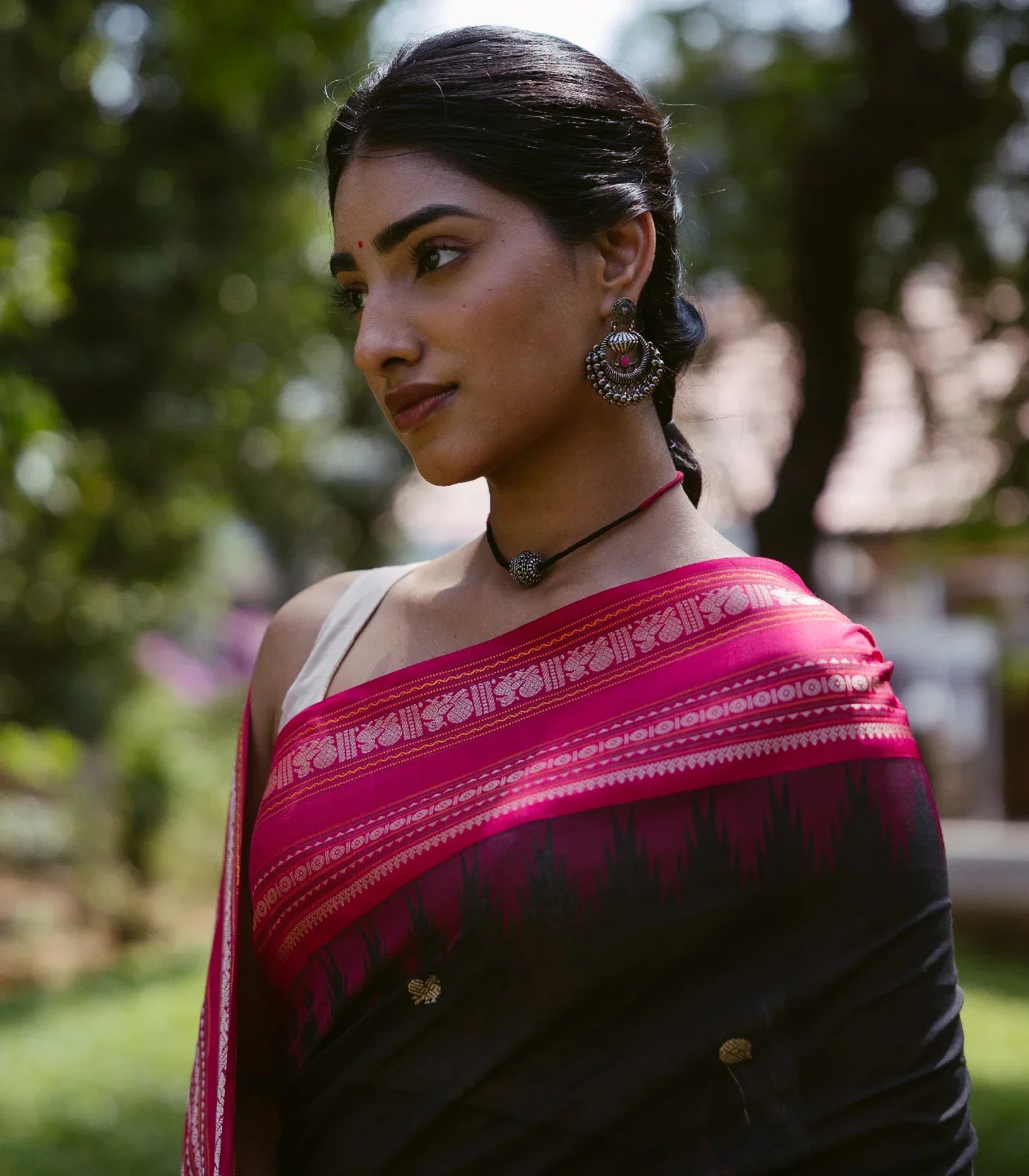 Black Handloom Korvai Kanchi Cotton Saree With Annam And Rudaksham Motifs in A Pink Border