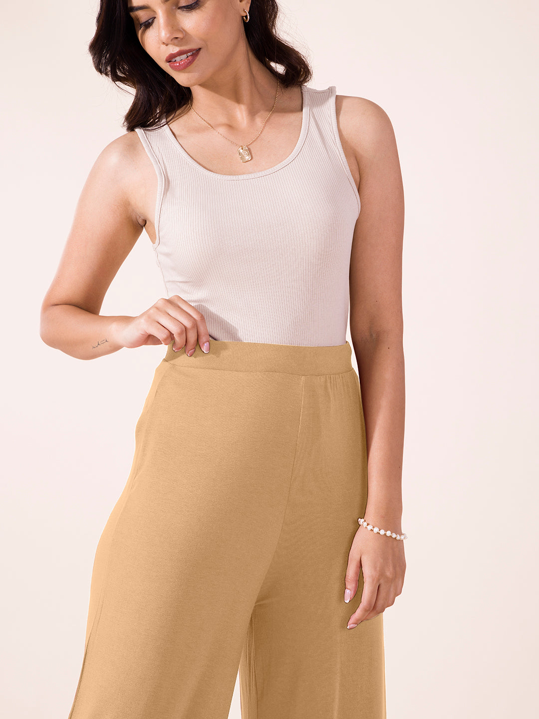 Women Solid Wheat Viscose Mid Rise Knit Palazzos