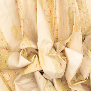 Cream Handloom Kanchipuram Silk Saree With Ikat Floral Buttas