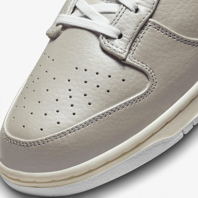 Nike | DUNK LOW  { METALLIC SILVER
