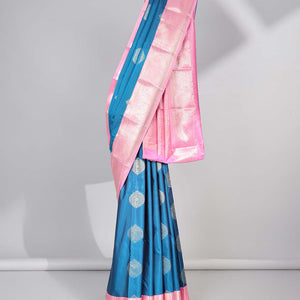 Blue floral motifs gift saree with contrast paisley border & intricate zari design pallu