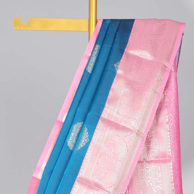 Blue floral motifs gift saree with contrast paisley border & intricate zari design pallu