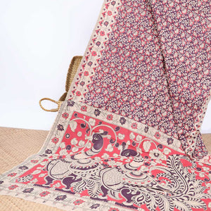 Purple floral machine-printed kalamkari cotton saree, contrast floral & geometric border & peacock pallu