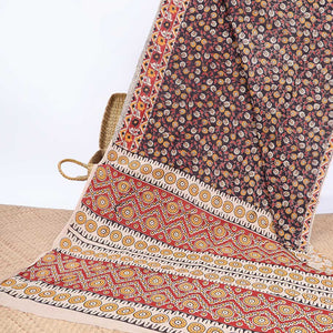 Brown floral vine machine-printed kalamkari cotton saree, contrast geometric border & intricate motifs pallu