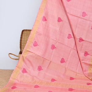 Red all over heart motifs tussar saree with self-intricate zari border