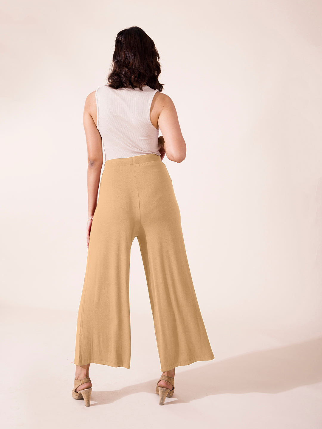 Women Solid Wheat Viscose Mid Rise Knit Palazzos