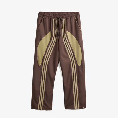 Adidas Originals | SONG FOR THE MUTE SPRING WOVEN PANTS { BROWN