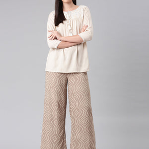 Women Beige Woven Viscose Mid Rise Printed Palazzo