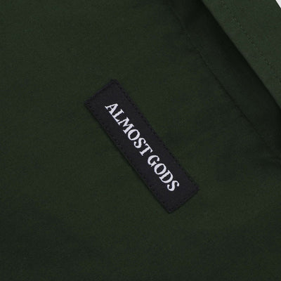 ALMOST GODS | ALPHA CROSS SPRAY PAINT SHIRT { GREEN