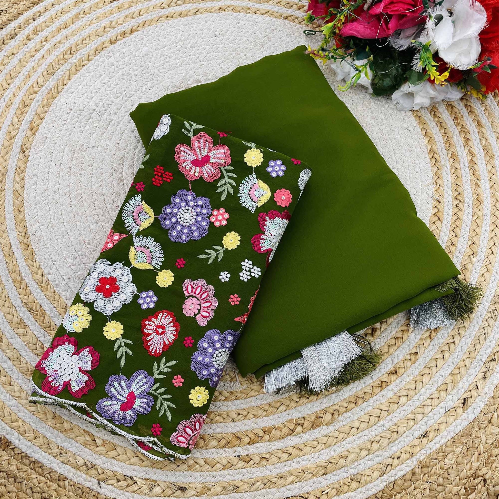 green-solid-georgette-saree-with-with-tassels