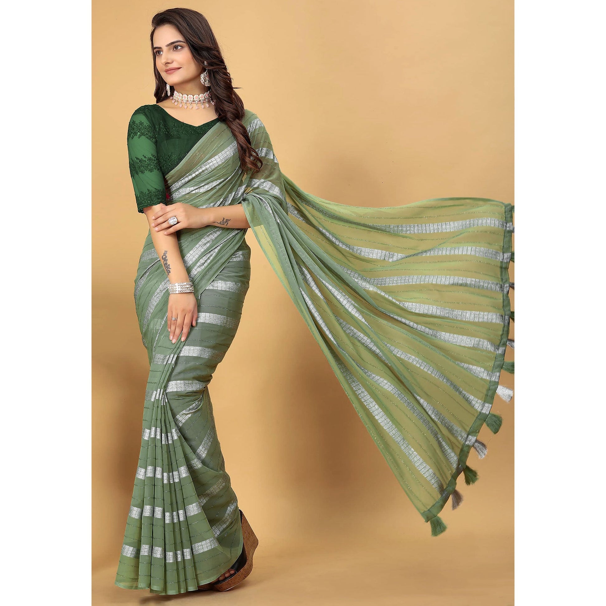 green-zari-striped-georgette-saree-with-tassels