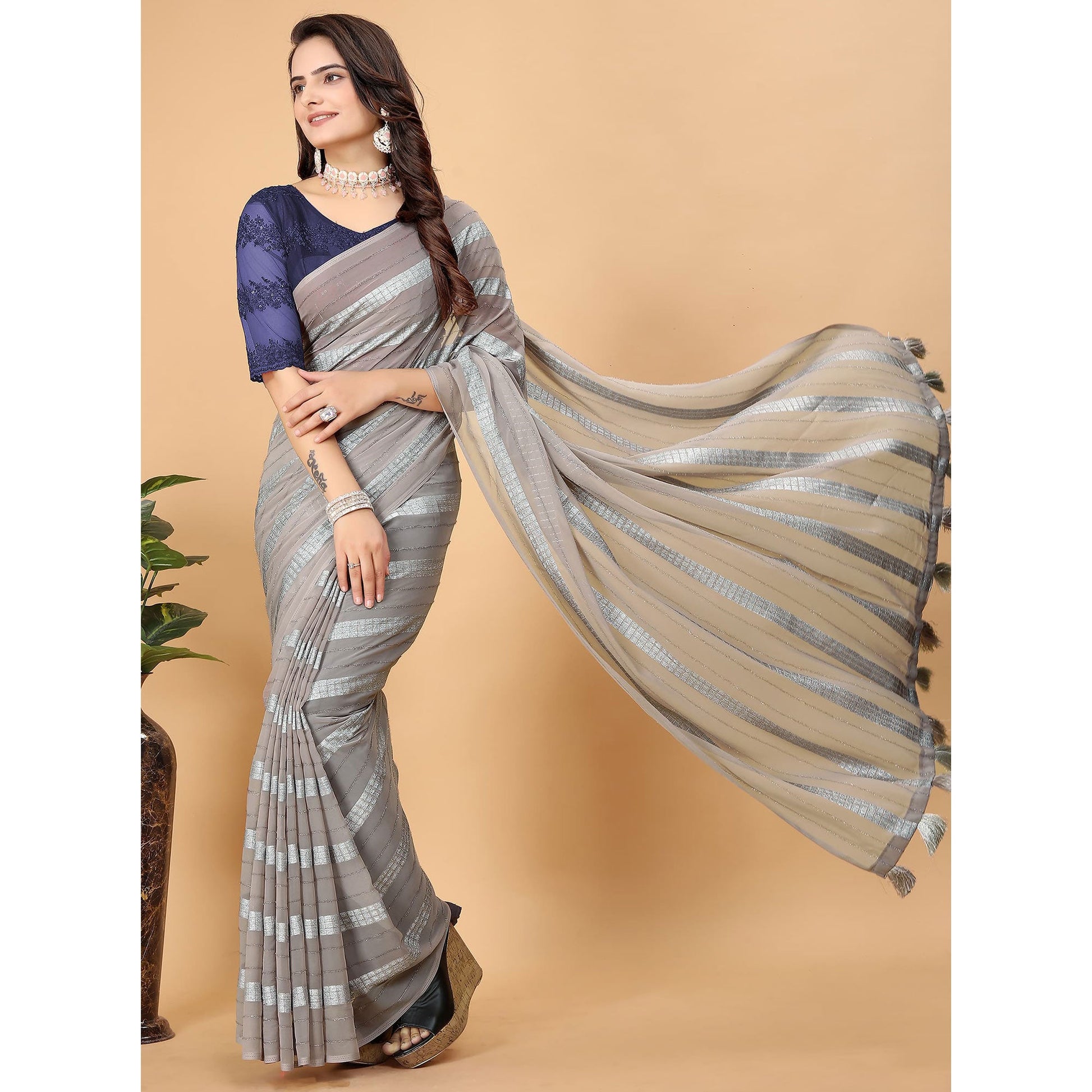 Grey Zari Striped Georgette Saree With Tassels