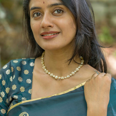 Casal Green Zari Weaving Satin Saree With Tassels