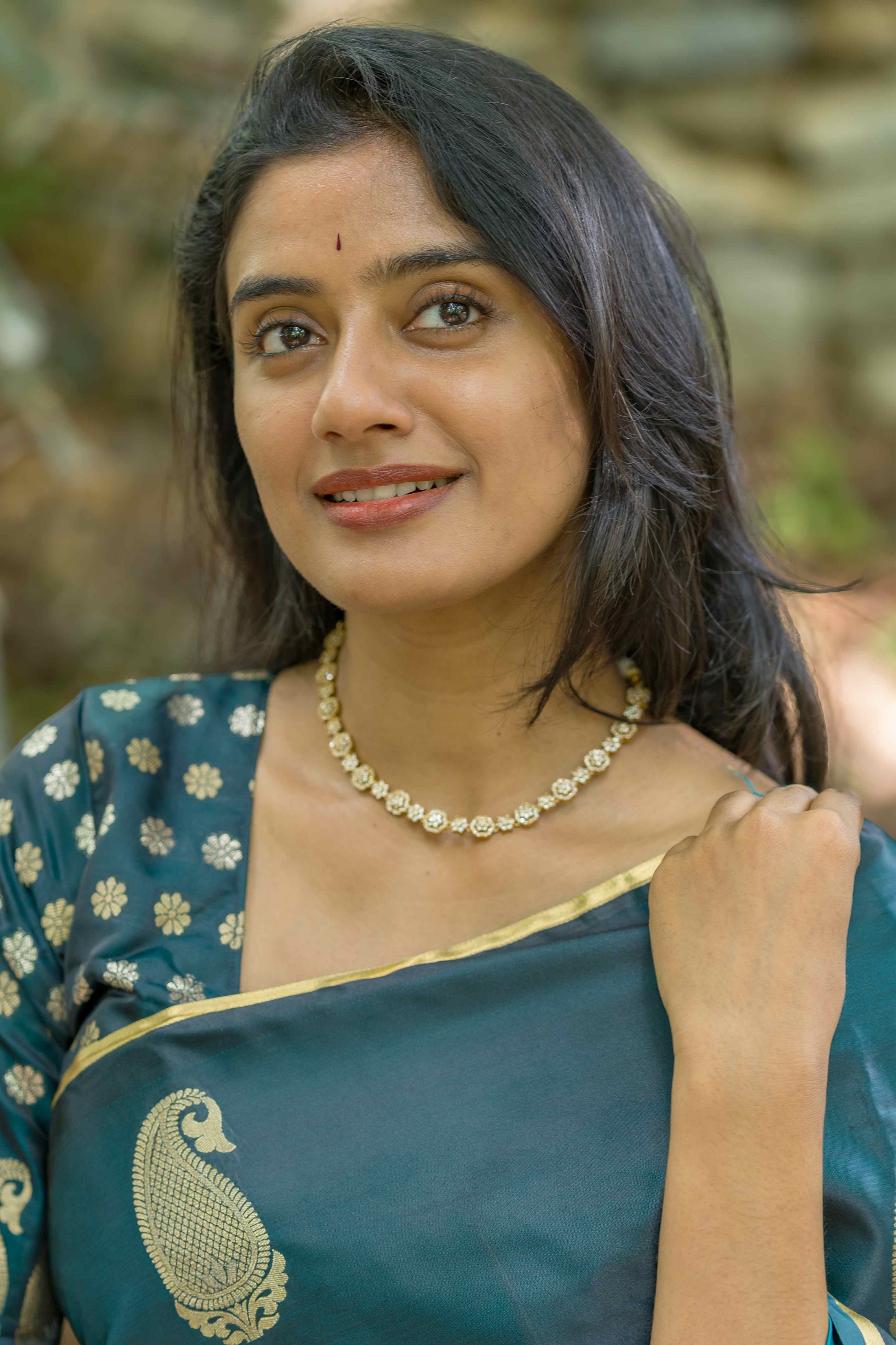 Casal Green Zari Weaving Satin Saree With Tassels