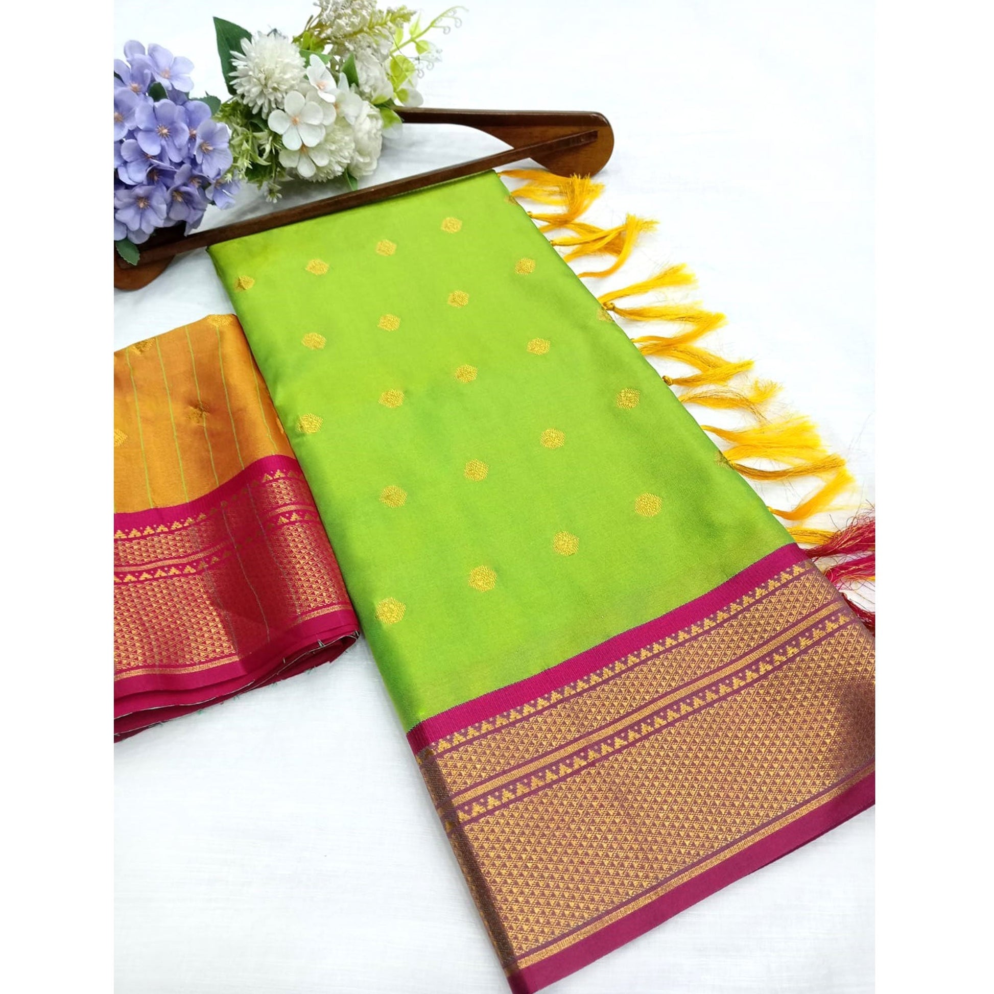 green-zari-woven-lichi-art-silk-saree-with-tassels