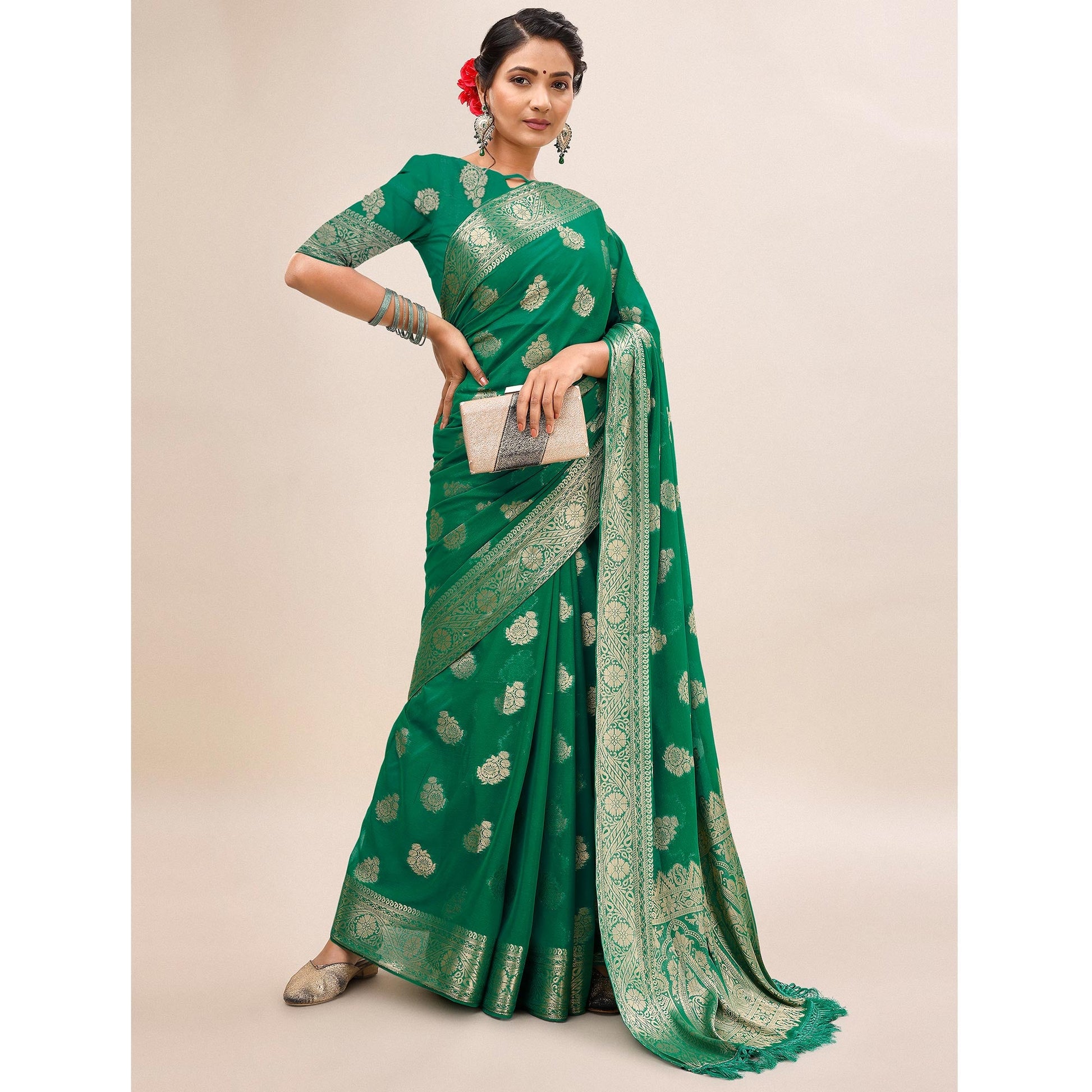 green-woven-chiffon-saree-with-tassels-1