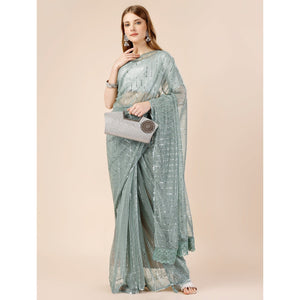 green-tikki-wor-lycra-saree-with-embroidered-border