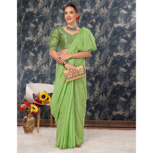 green-printed-with-zari-work-chiffon-saree-with-lace-border