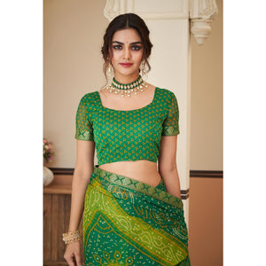 green-bandhani-printed-chiffon-saree-with-lace-border