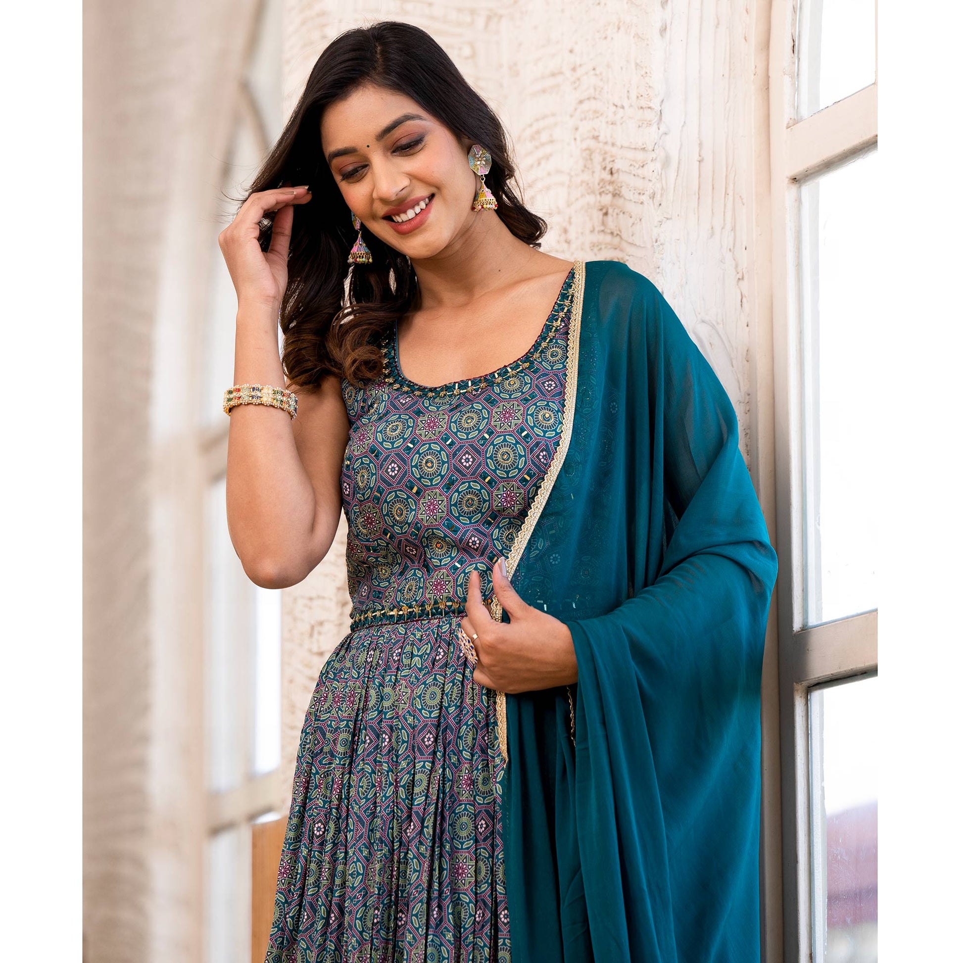 Morpich Blue Printed Dola Silk Anarkali Style Gown With Mirror Work