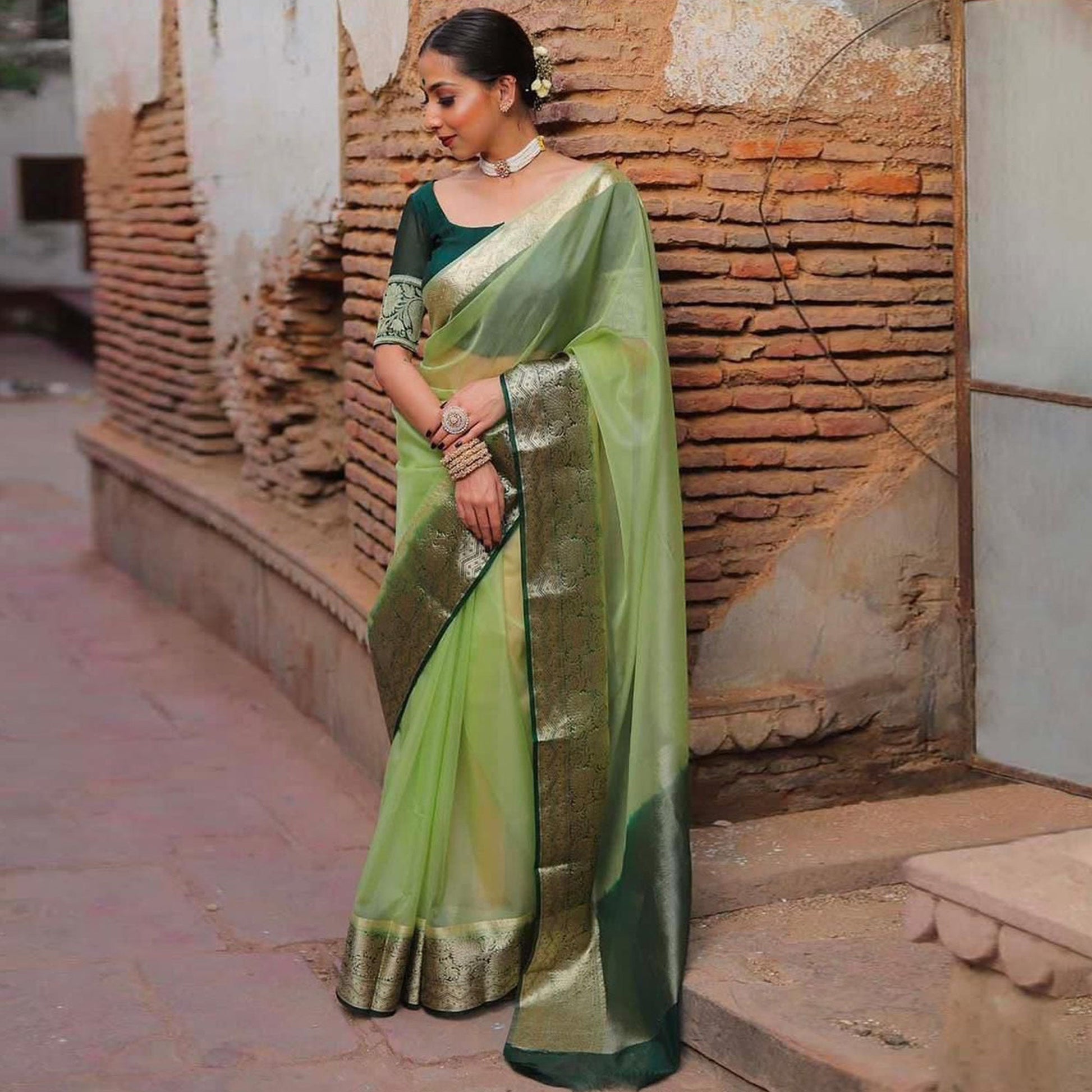 green-solid-organza-saree-with-zari-border