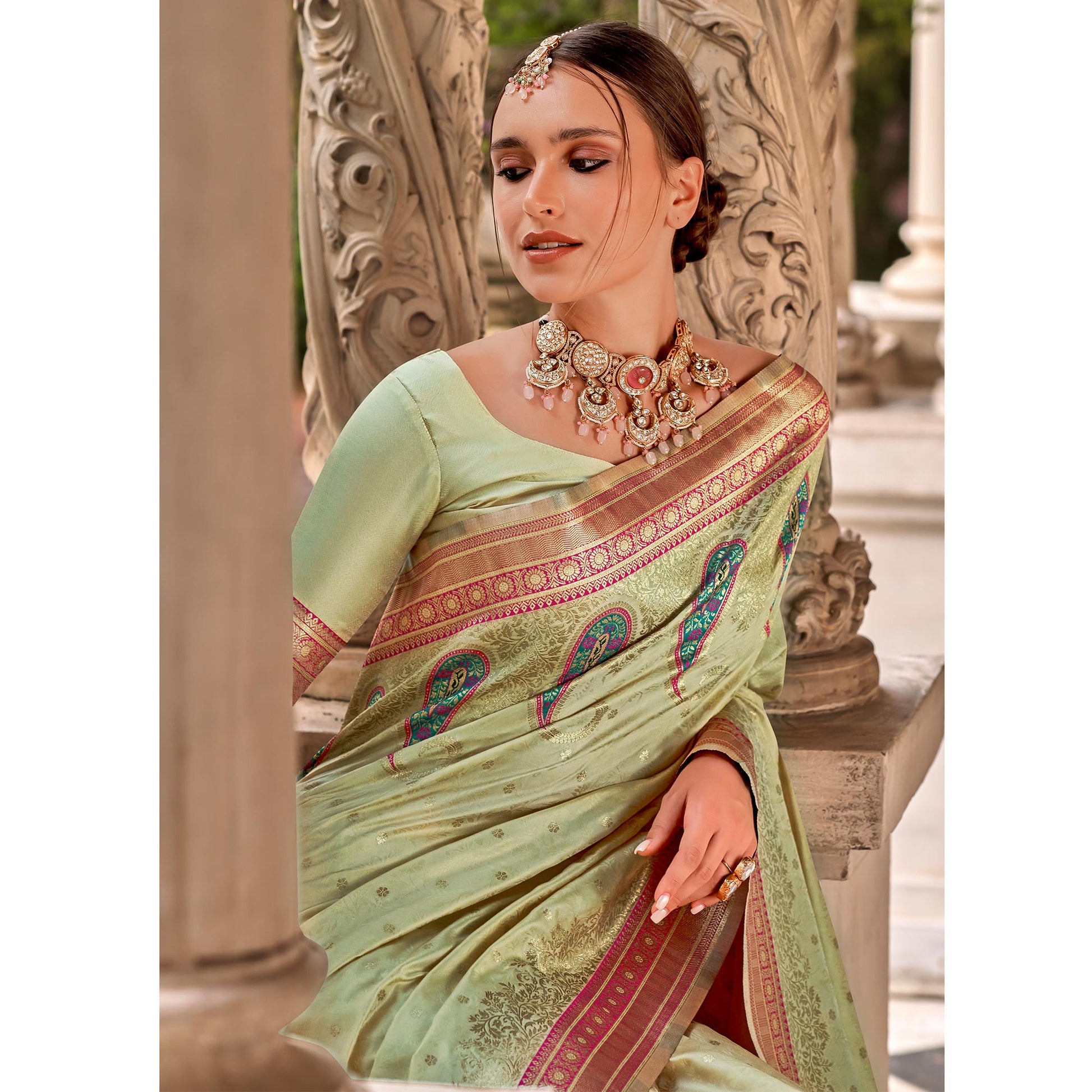 Chikoo Floral Woven Banarasi Silk Saree With Tassels