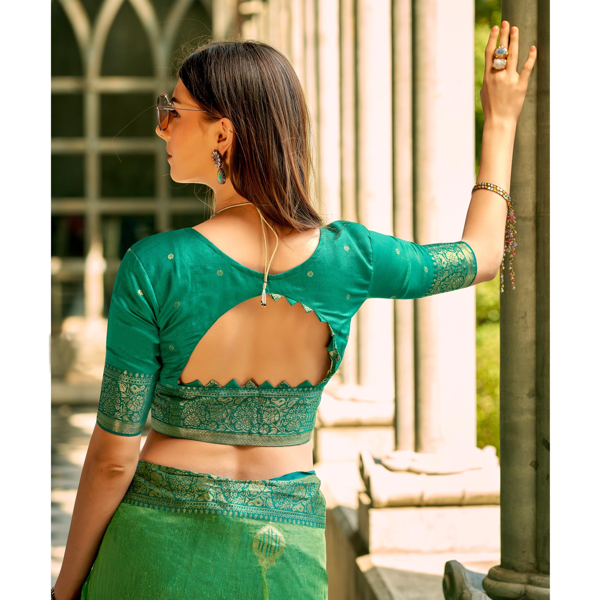 green-floral-woven-tissue-silk-saree-with-tassels-1