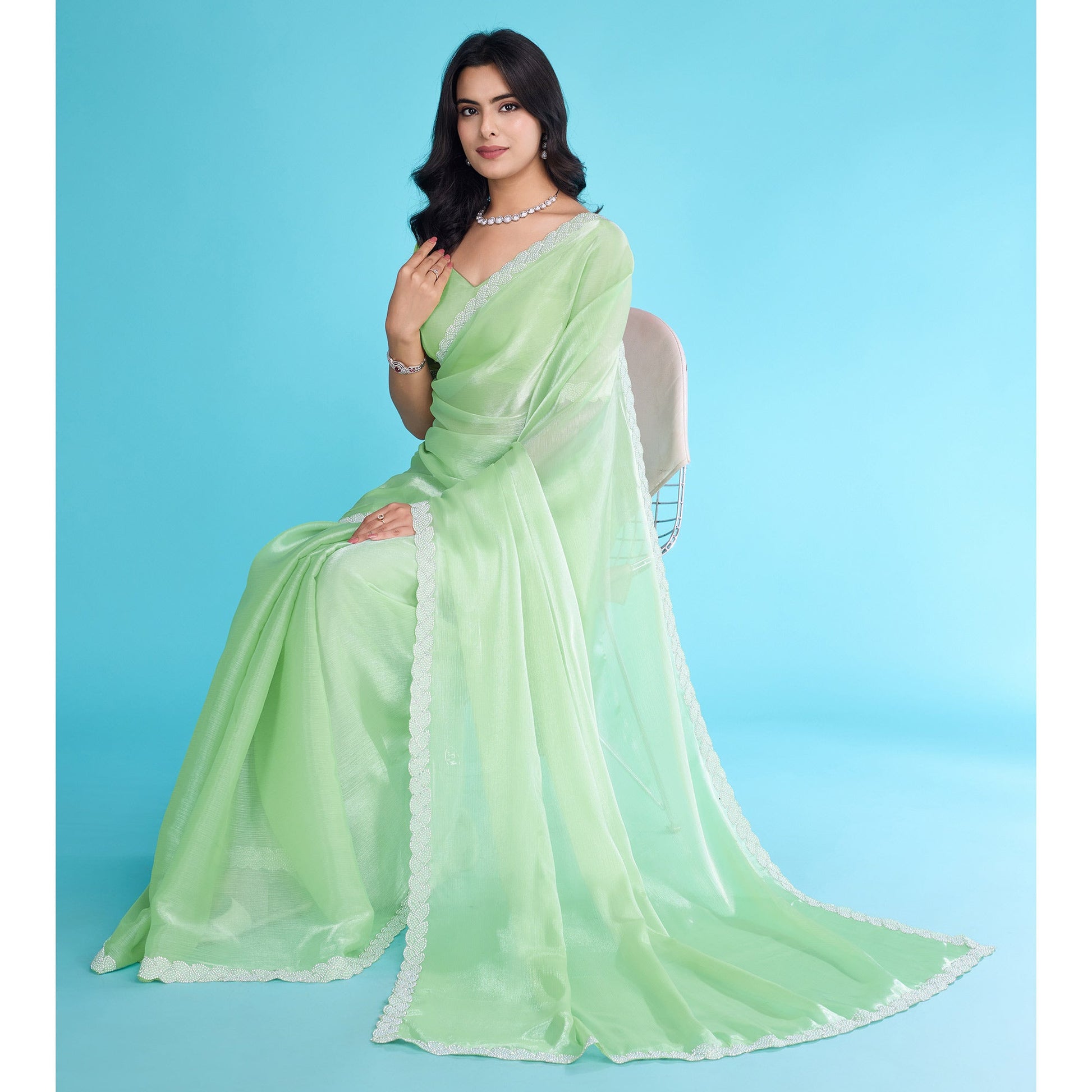 green-solid-with-zarkan-ceramic-pearl-diamond-lace-tissue-saree