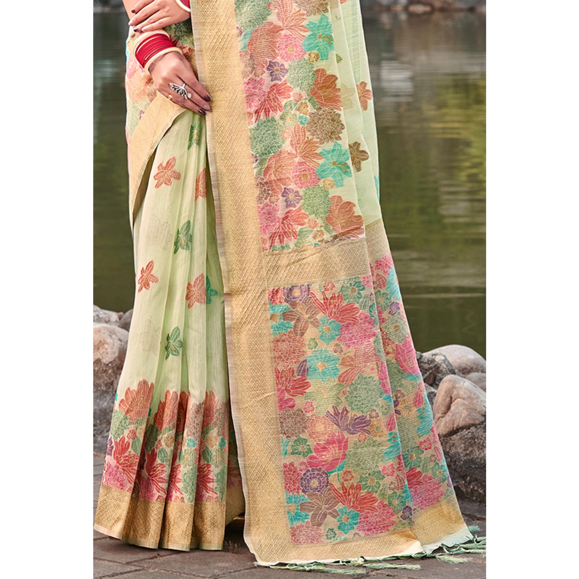 Light Green Woven Cotton Blend Saree With Tassels