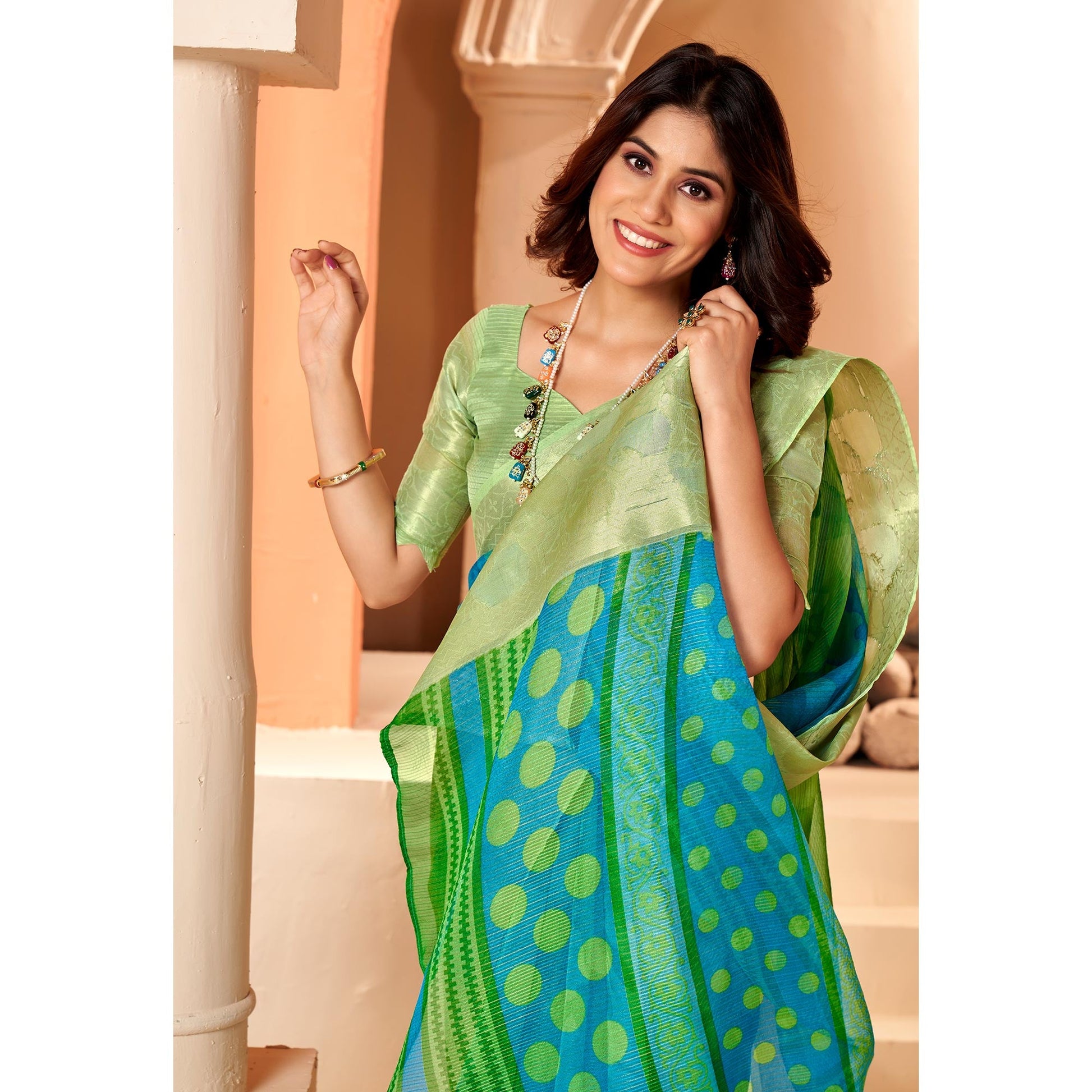 1green-blue-printed-organza-saree-with-woven-border