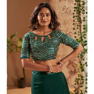 Dark Green Woven Georgette Saree With Tassels