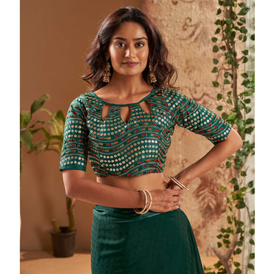 Dark Green Woven Georgette Saree With Tassels