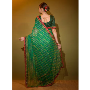 green-foil-printed-georgette-saree-with-embroidered-border