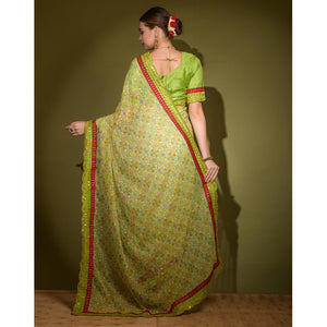 green-patola-foil-printed-georgette-saree-with-embroidered-border