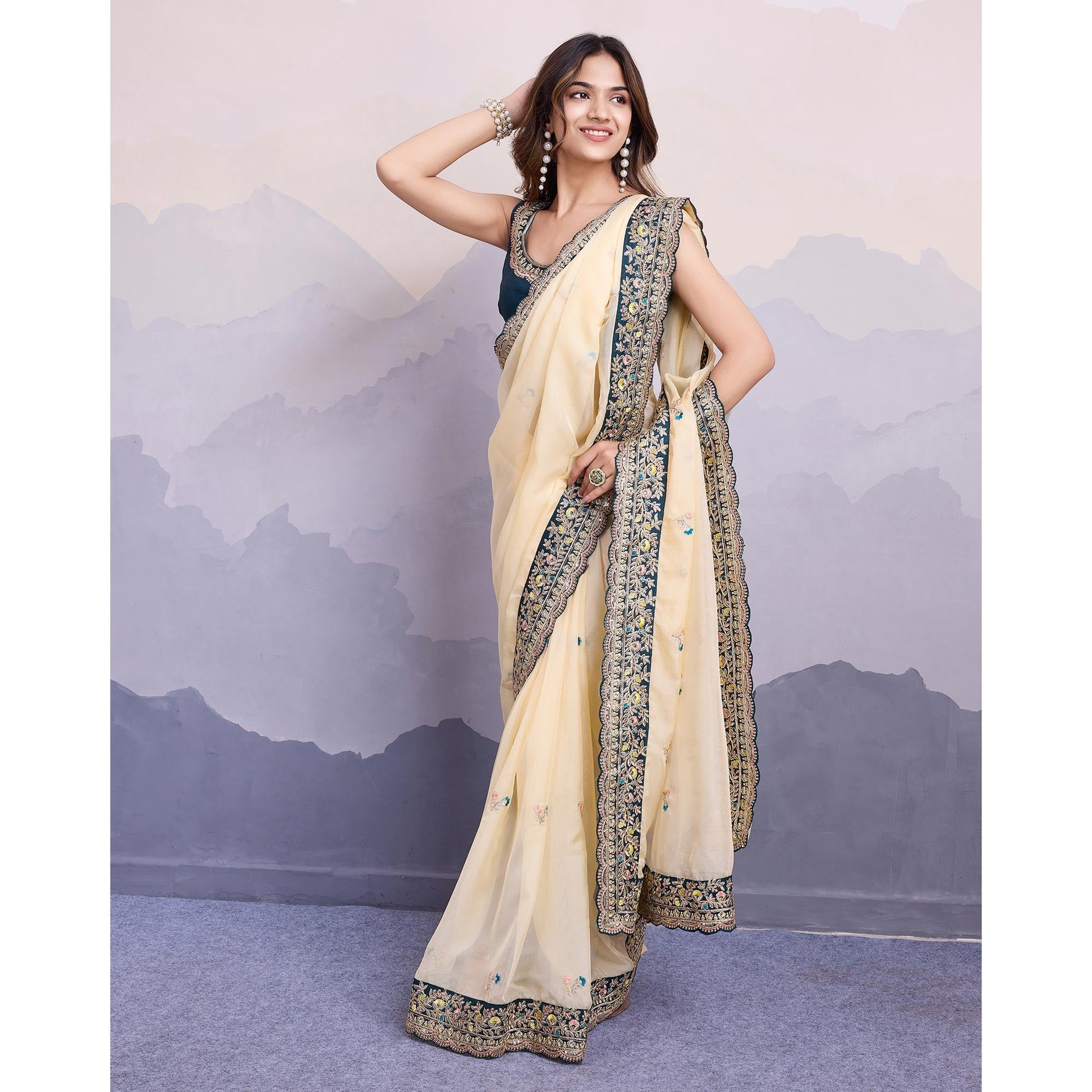 Cream Floral Sequins Embroidered Organza Saree With Lace Border