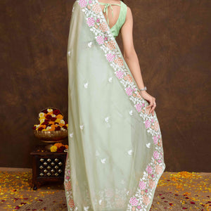 green-floral-sequins-embroidered-organza-silk-saree