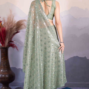 green-sequins-embroidered-twill-net-saree