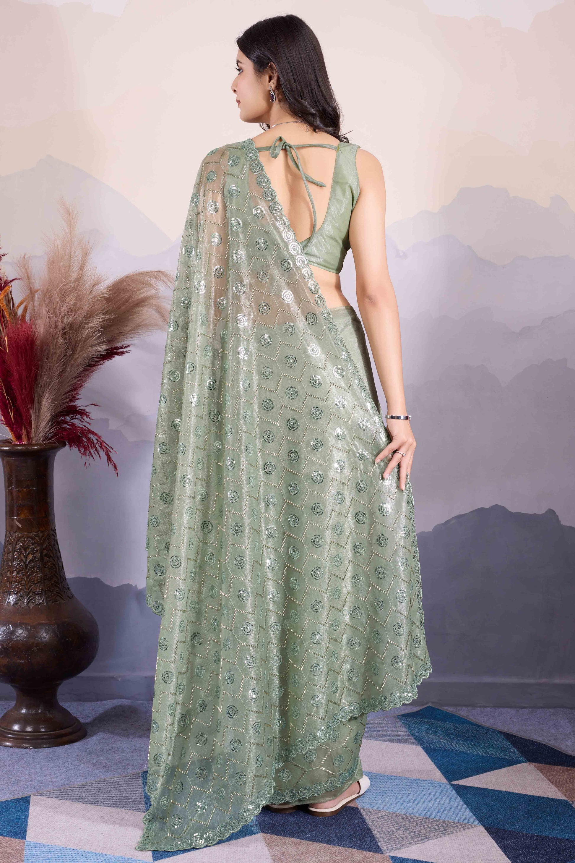 green-sequins-embroidered-twill-net-saree