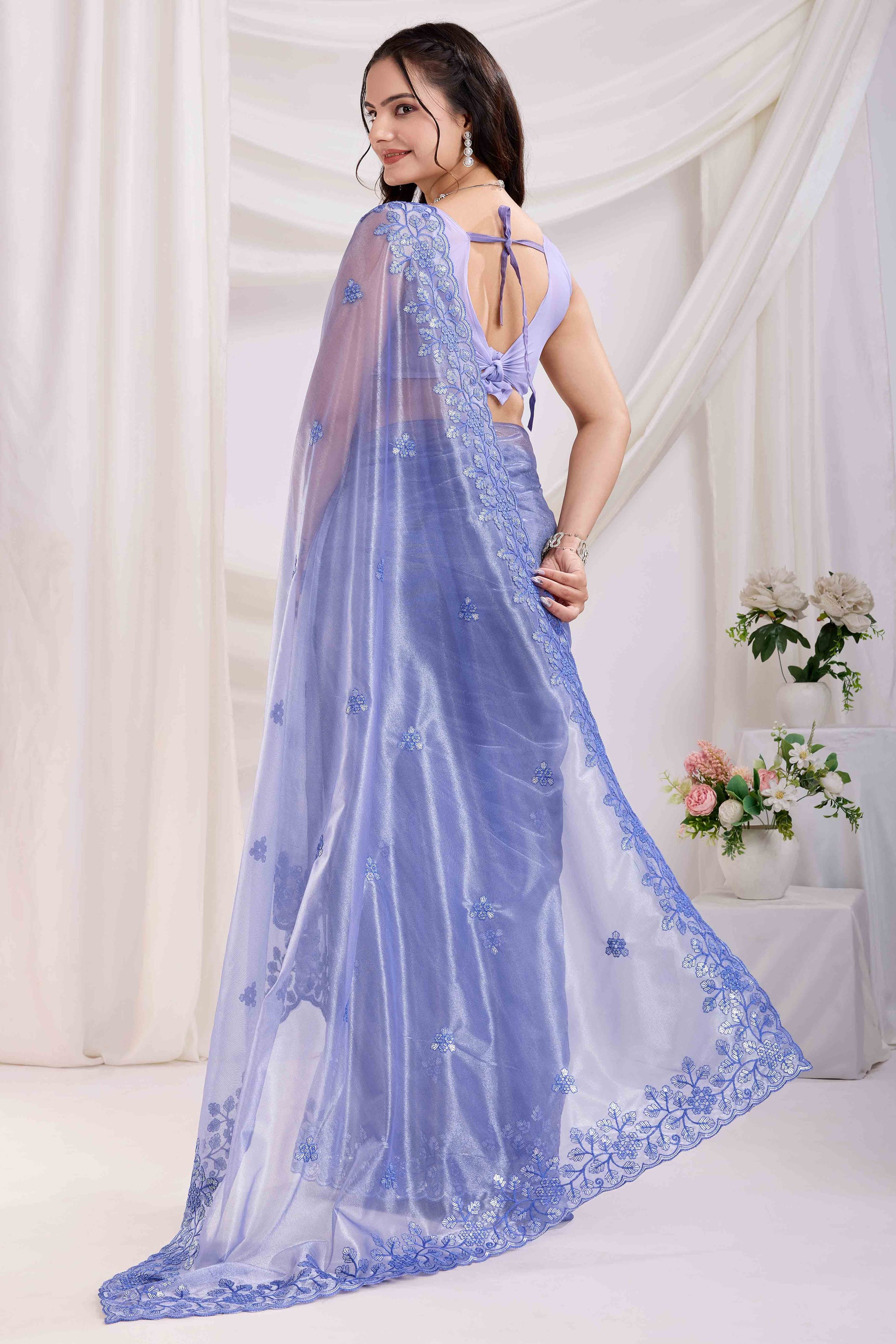 Lavender Floral Sequins Embroidered Twill Net Saree