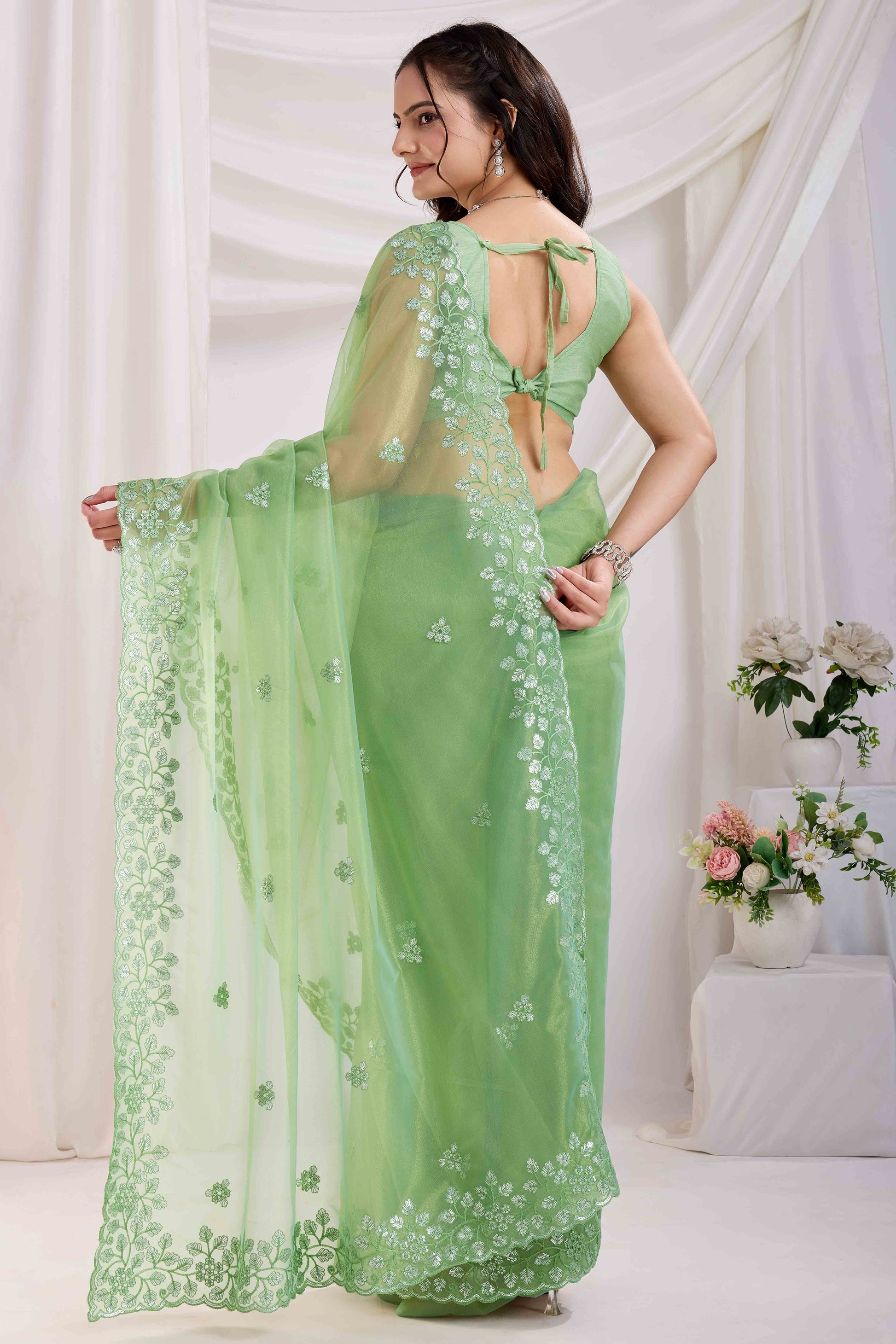 green-floral-sequins-embroidered-twill-net-saree-8