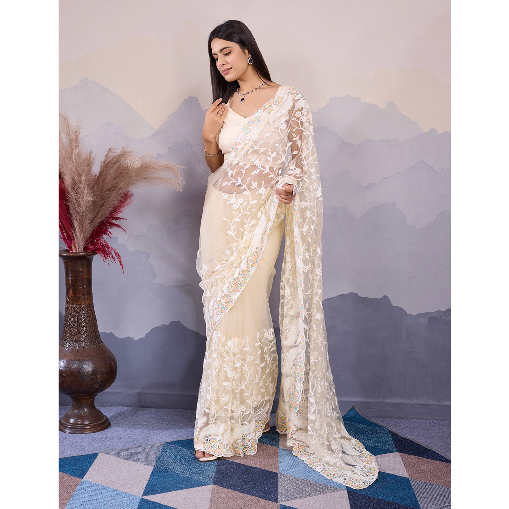 Cream Floral Thread Embroidered Net Saree