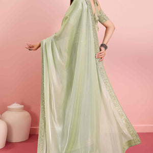 green-solid-with-floral-sequins-embroidered-jimmy-choo-tissue-saree