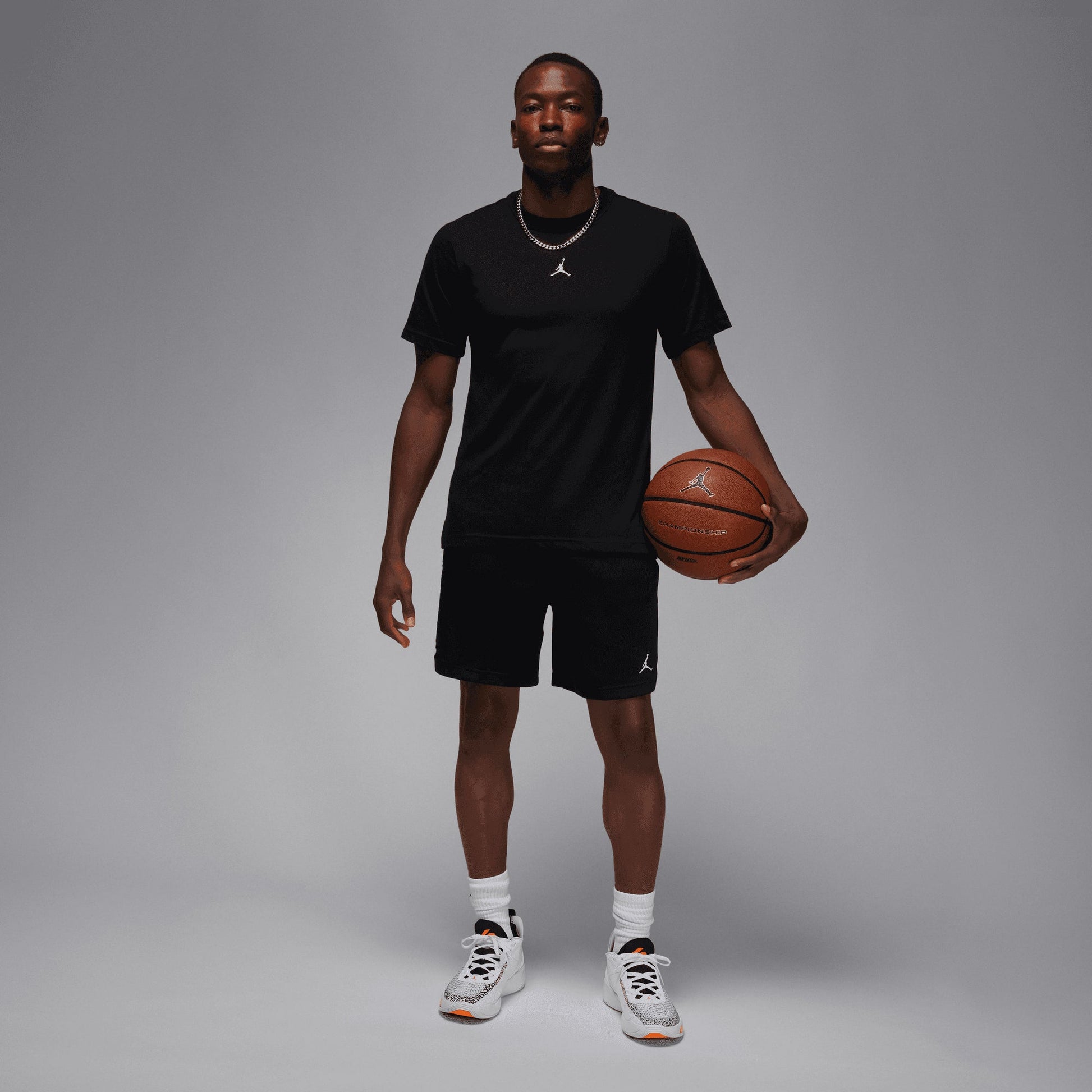 JORDAN | DRI FIT SHORT-SLEEVE TOP { BLACK