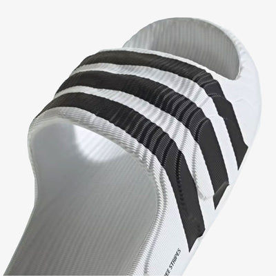 ADIDAS ORIGINALS | ADILETTE 22 SLIDES { WHITE/BLACK
