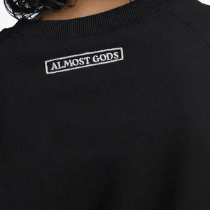 ALMOST GODS | ALPHA CROSS HAND EMBROIDERED AARI SWEATSHIRT { BLACK