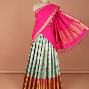 Green floral buttas art-silk half saree, contrast traditional zari border,zari design blouse & floral design dhavani
