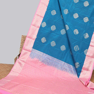 Blue floral motifs gift saree with contrast paisley border & intricate zari design pallu