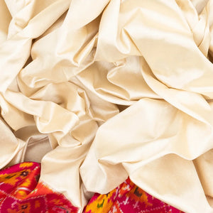 White Handloom Ikat Silk Saree With Contrast Pink Border