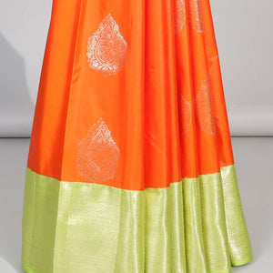 Orange floral motifs gift saree with contrast paisley border & intricate zari design pallu